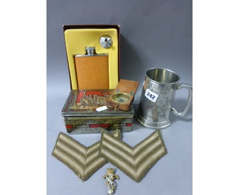 Mahogany Cased Compass, Pair of Army Cloth Badges, Military Cap Badge, The Battle of Waterloo Pewter Tankard and a Boxed Hip 