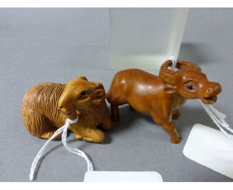 Signed Wood Netsuke of a Cow and a Wood Netsuke of a Ram