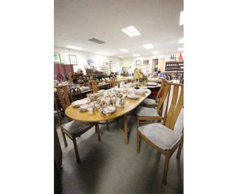 Ercol Pale Oak Oval Extending Dining Table with Six Ercol Dining Chairs