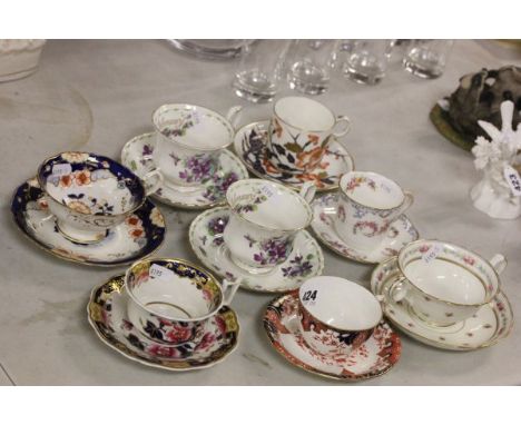 Seven Cabinet Cups and Saucers including 19th century, Royal Crown Derby, Royal Albert plus Soup Bowl & Saucer