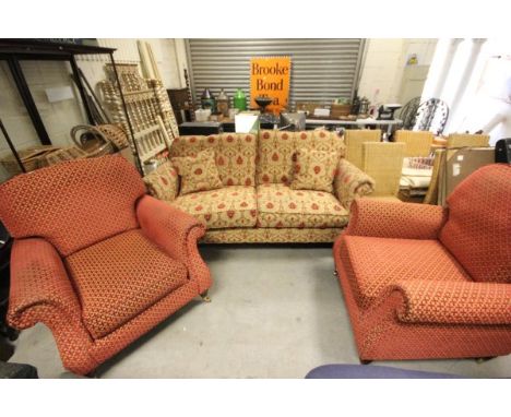 Contemporary Multi-York Two Seater Sofa upholstered in gold and red floral pattern raised in turned wooden legs and castors t