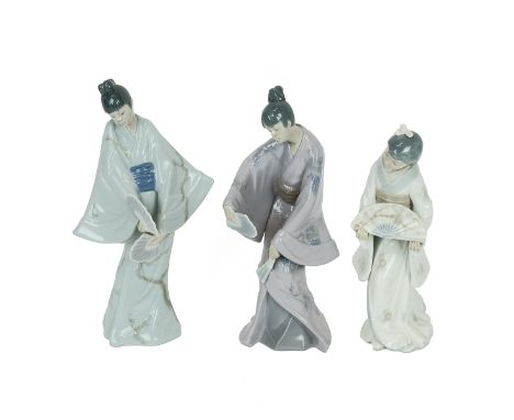 Three Lladro Nao porcelain figurines of Geishas with fans, two dated 1990. one 1977. Heights 30cm, 29cm and 26cm. &nbsp;(M)