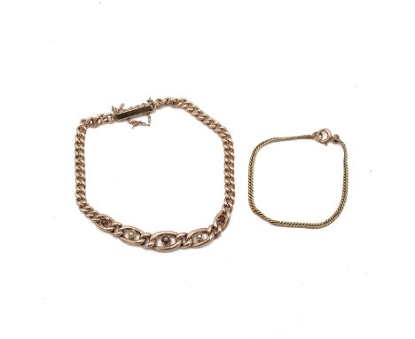 An Edwardian gold, pearl and ruby set bracelet, along with a 9ct gold child's bracelet, 9.04 grams.&nbsp;
