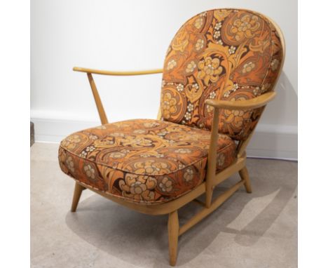 Ercol model 203 light elm lounge chair with 60's orange and brown floral fabric cushions. (C)&nbsp;