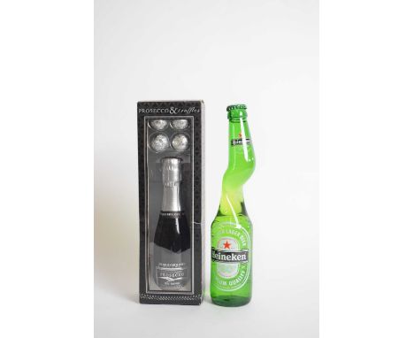 Boxed mini bottle of Prosecco and truffles, together with a novelty bottle of Heinekin Beer