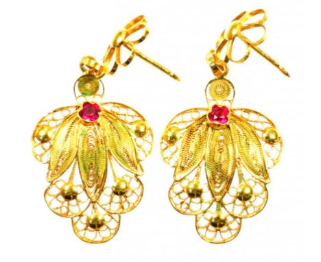 TWO SYNTHETIC RUBY SET GOLD FILIGREE LEAF EARRINGS MARKED 18CT, 6.8G