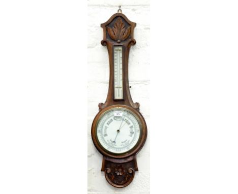 A CARVED OAK ANEROID BAROMETER, 82CM H, EARLY 20TH CENTURY