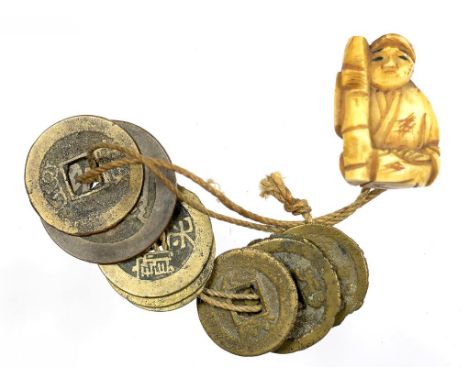 A JAPANESE CARVED IVORY NETSUKE, 2.5CM H, MEIJI PERIOD AND SEVERAL CHINESE BRASS COINS