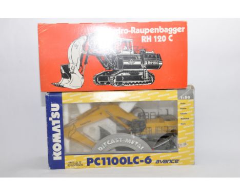 Conrad 1/50 O&K RH 120 C Shovel plus Joal Komatsu PC1100LC-6 Excavator. Both E to NM in G Boxes. (2)