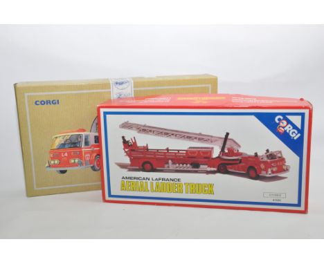 Pair of Corgi American La France Fire Ladder Trucks. NM in Boxes. (2)