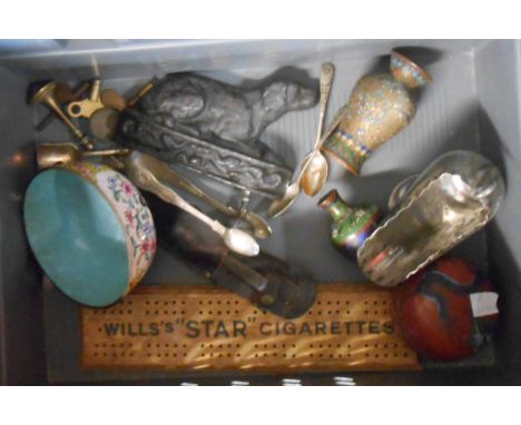 A crate containing a quantity of assorted metalware and other collectable items including cloisonne vases, cast iron dog patt