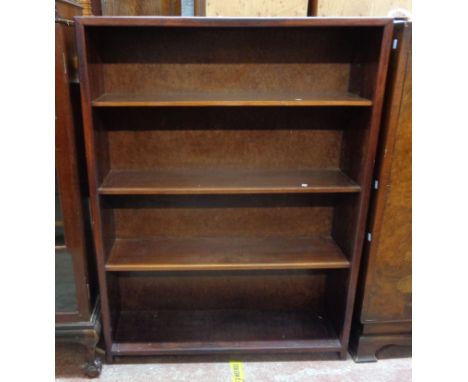 An 87cm vintage stained mahogany four shelf open bookcase