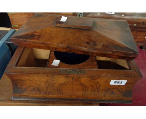 A Victorian walnut veneered sarcophagus form tea caddy - liners and mixing bowl missing and hinged lid detached