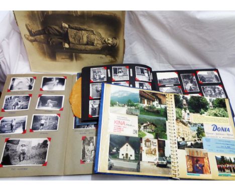 Four albums containing 20th Century monochrome family photographs including numerous figures, holiday shots, etc. Also an unf