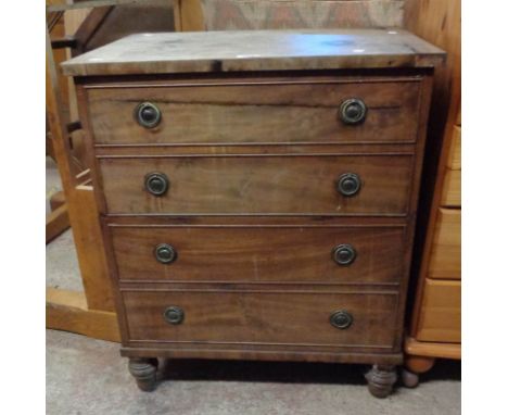 An early 19th Century mahogany commode with faux drawer fronts, set on turned feet - no liner, split