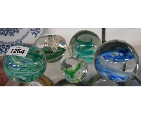 Five glass paperweights including internal enamel and controlled bubble examples