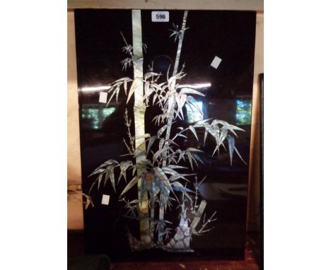 A modern Japanese black lacquered panel with inlaid mother-of-pearl bamboo decoration