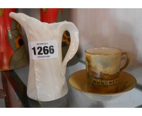 A Graingers Worcester demi-tasse coffee cup and saucer with hand painted scene depicting birthplace of Shakespeare - sold wit