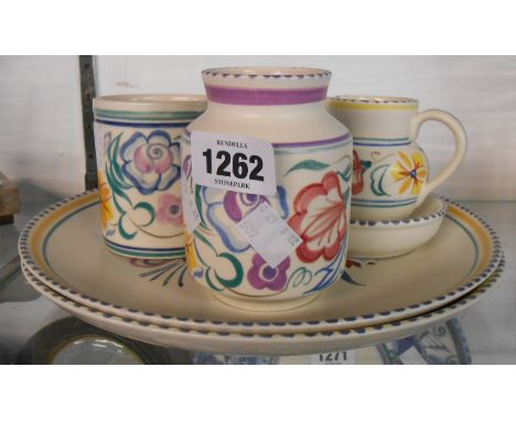A small quantity of Poole Pottery comprising vases, jug, dish and two plates
