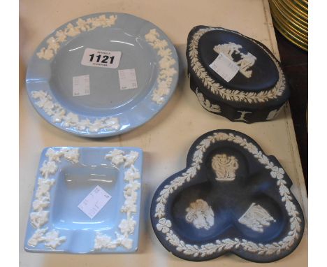 A Wedgwood black jasper lidded trinket box and a similar dish - sold with two embossed Queensware ashtrays