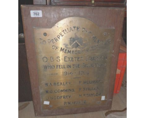 An old wooden mounted brass memorial plaque marked 'To Perpetuate the Memory of Members of the O.B.S. Exeter Branch who Fell 