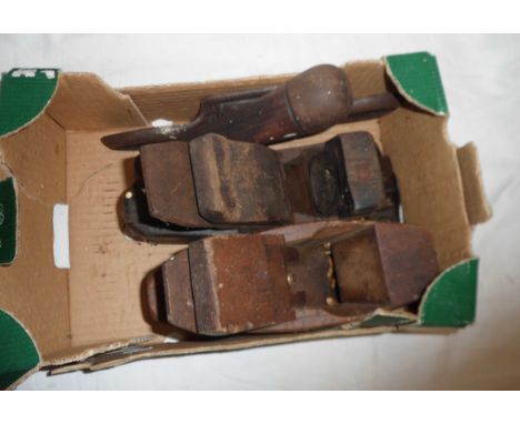 A box containing a small quantity of old tools including wooden box planes, metal finger plane