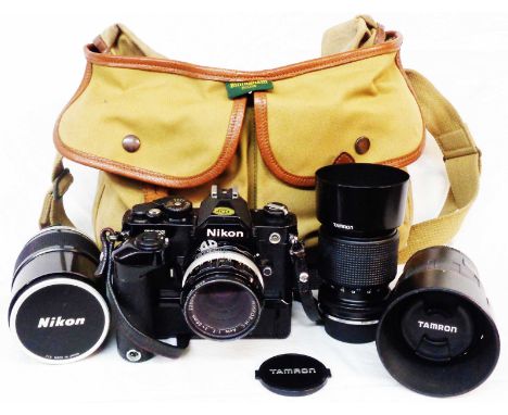 A Billingham soft case containing a Nikon FM2 camera body with motor drive and Nikkor -H-C 50mm lens (with manual) - sold wit