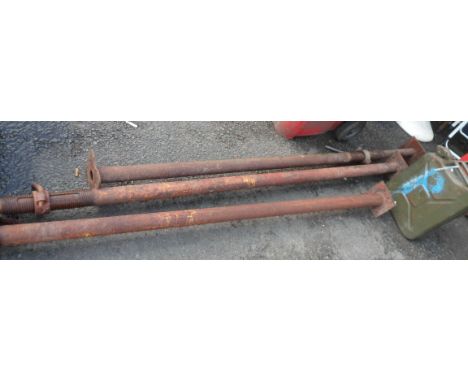 Three old Acrow props