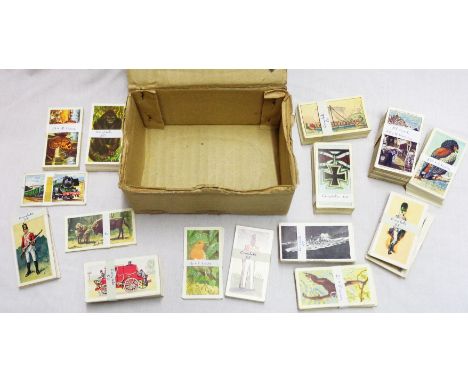 A box containing a quantity of cigarette and other trade cards including Murray Sons &amp; Co, Wills, Tony L. Oliver, Robert 