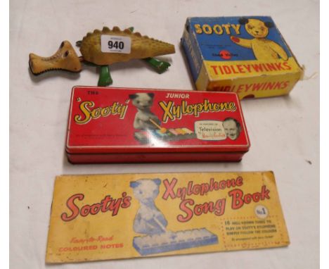 A small selection of vintage toys comprising The Sooty Xylophone in original tin box, two Sooty's xylophone songbooks, a Chad