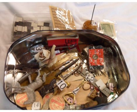 A box containing a quantity of collectable items including clock keys, brass button cleaner, old glass cutter, vintage Fry's 