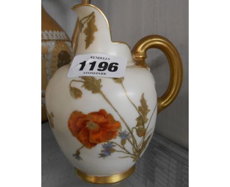 A small Royal Worcester porcelain jug of helmet form decorated with hand painted floral sprays with gilt highlighting on an i