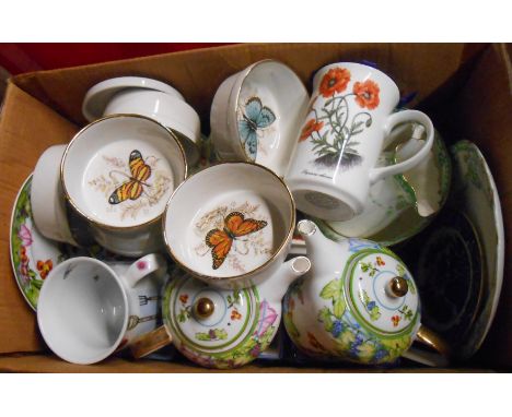 A box containing a quantity of ceramic items including Royal Worcester saucer, teaware, etc.