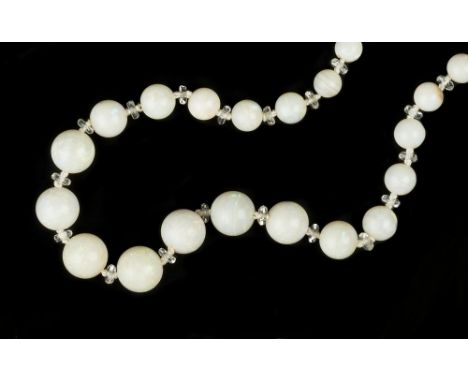 AN OPAL BEAD NECKLACE, the single strand of graduated opal beads with colourless spacers between, on a later extension chain,