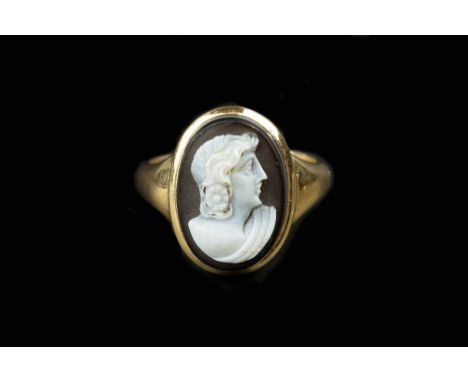 A HARDSTONE CAMEO RING, the oval agate cameo carved with a classical portrait profile, to an 18ct gold mount hallmarked for L