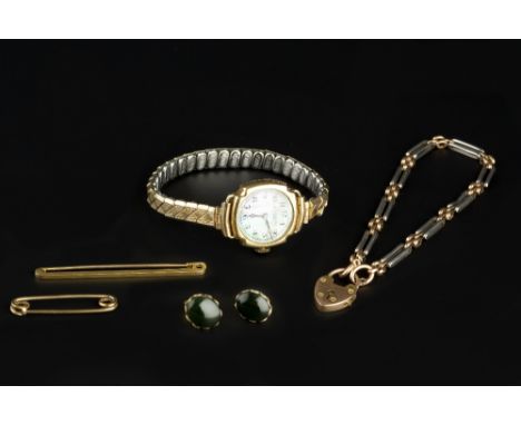A COLLECTION OF JEWELLERY, comprising a two colour gate-link bracelet, with padlock clasp stamped '15ct', a lady's 18ct gold 