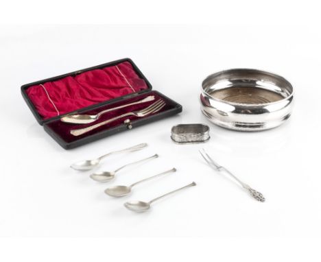 A LATE VICTORIAN SILVER CHRISTENING KNIFE AND FORK, Sheffield 1896, cased; a silver bottle coaster, with turned wooden base, 