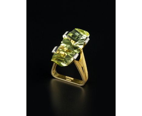 A GREEN BERYL AND DIAMOND DRESS RING BY ANDREW GRIMA, the fancy-cut green beryl set between four bar-shaped claws, each highl