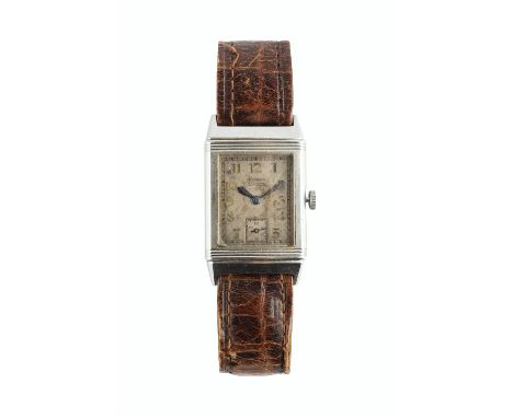 A GENTLEMAN'S STAINLESS STEEL 'REVERSO' WRISTWATCH BY LECOULTRE, the rectangular silvered dial with gilt Arabic numerals, sub