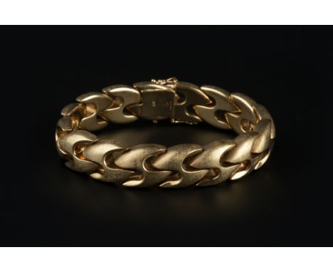 A 9CT GOLD FANCY-LINK BRACELET, of brushed finish, maker's mark 'CJ LD', with London import marks, length 19cm