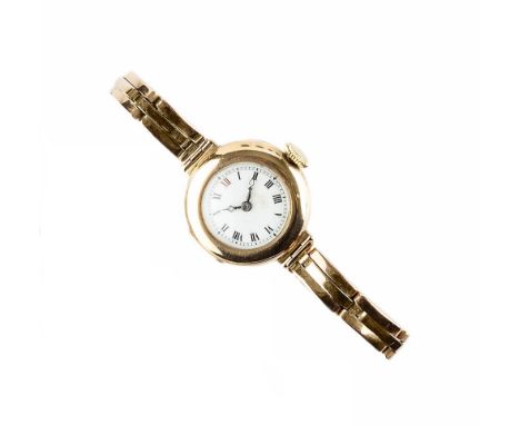A LADY'S 9CT GOLD BRACELET WATCH, the circular white dial with black and red Roman numerals and outer minute divisions, to a 