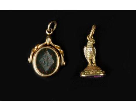 A COLLECTION OF GEORGIAN AND LATER HARDSTONE FOB SEALS, to include a vari-coloured bird fob seal, with initialled amethyst ba