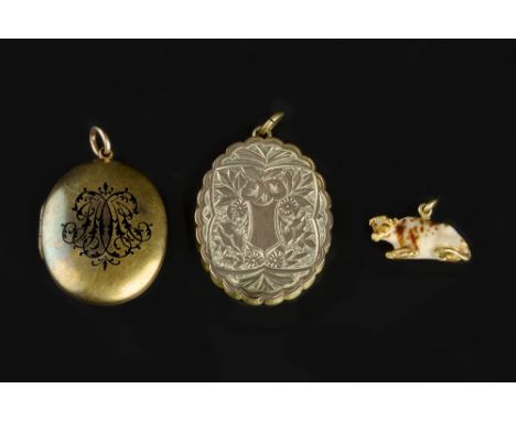 THREE PENDANTS, comprising an oval locket pendant, with black enamel monogram, a further locket pendant, with engraved foliat