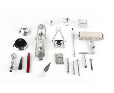 A COLLECTION OF MAINLY LATE VICTORIAN AND EDWARDIAN SILVER WRITING AND DESK ACCESSORIES, comprising a roller blotter by Willi