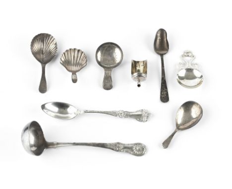 FOUR GEORGIAN SILVER CADDY SPOONS TO INCLUDE one with scalloped bowl by Walter Brind, London 1786; another in the form of a s