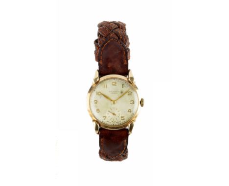 A GENTLEMAN'S 9CT GOLD CASED WRISTWATCH, the circular silvered dial with gilt Arabic numerals and subsidiary seconds dial, si