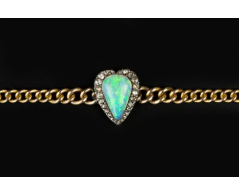 AN OPAL AND DIAMOND SET BRACELET, the curb-link bracelet centred with a pear-shaped cabochon opal, bordered by graduated rose