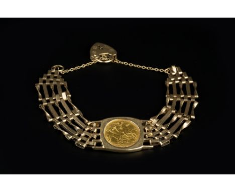 A HALF SOVEREIGN SET BRACELET, the Edward VII half sovereign dated 1910, loose mounted to a 9ct gold gate-link bracelet, leng