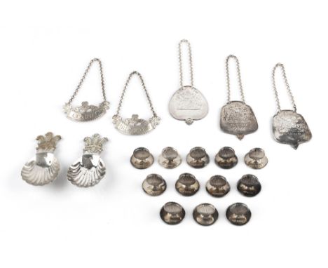 A SET OF TWELVE SILVER SCALLOP FORM MENU HOLDERS, on circular bases, London 1967, two silver commemorative scallop form caddy