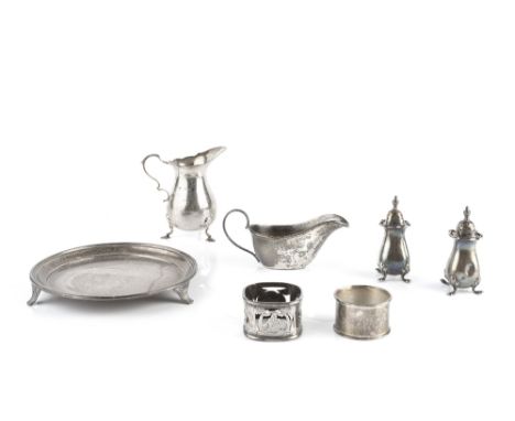 A COLLECTION OF SILVER, comprising a circular waiter by Barker Bros Silver Ltd, Birmingham 1934, 15cm diameter; a baluster cr